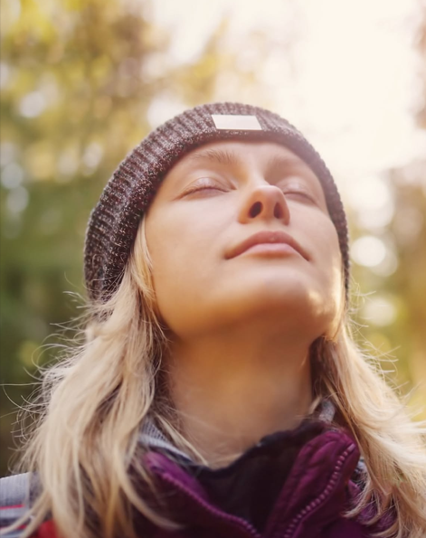 Women supporting each other in nature
